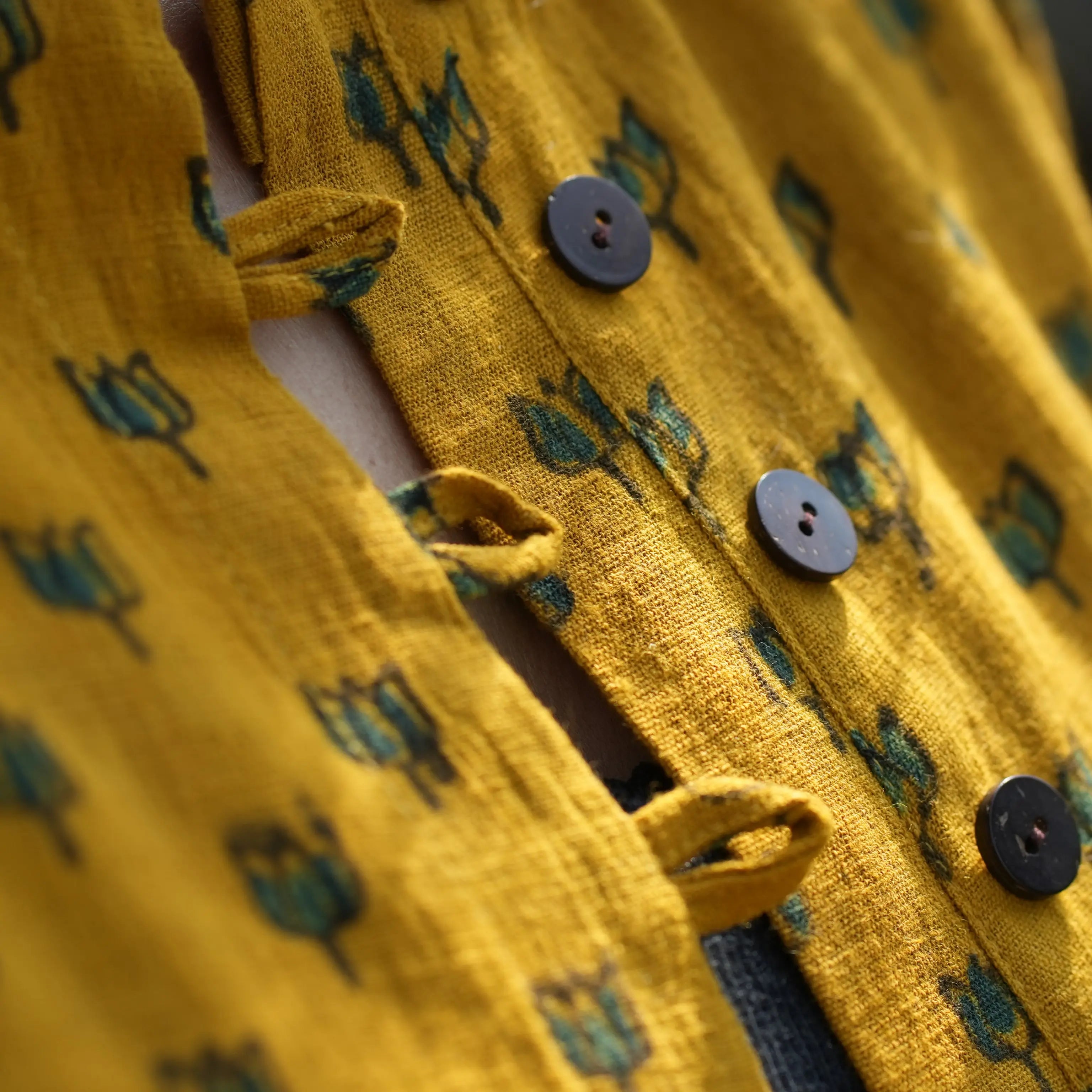 YELLOW AJRAK TOP WITH KALI IN THE BACK